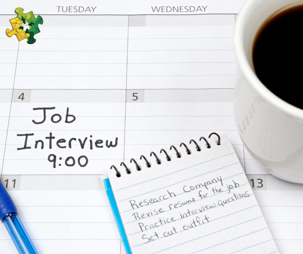 Schedule with a job interview for 9:00. A notebook with notes to prepare for the interview