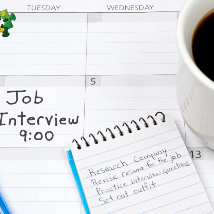 Schedule with a job interview for 9:00. A notebook with notes to prepare for the interview